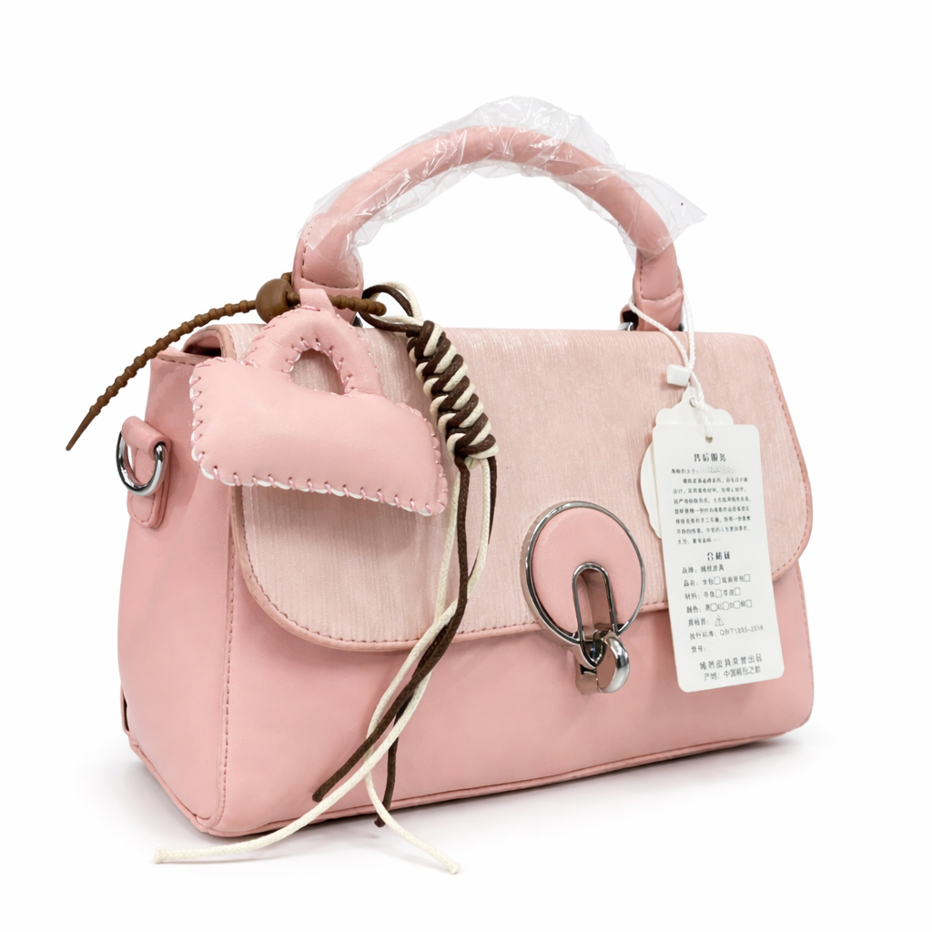 A Elegant Blush Pink Top Handle Mini Handbag with Heart Charm & Metal Lockđź‘›