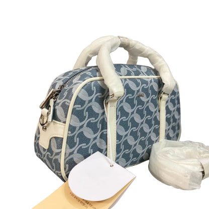 A  Elegant Blue Jacquard Mini Boston Bag with Ivory Leather Trim