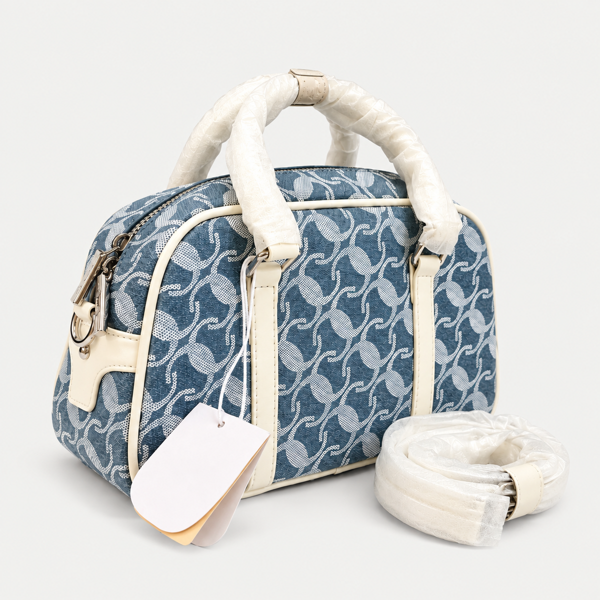 Elegant Blue Jacquard Handbag with Cream Details
