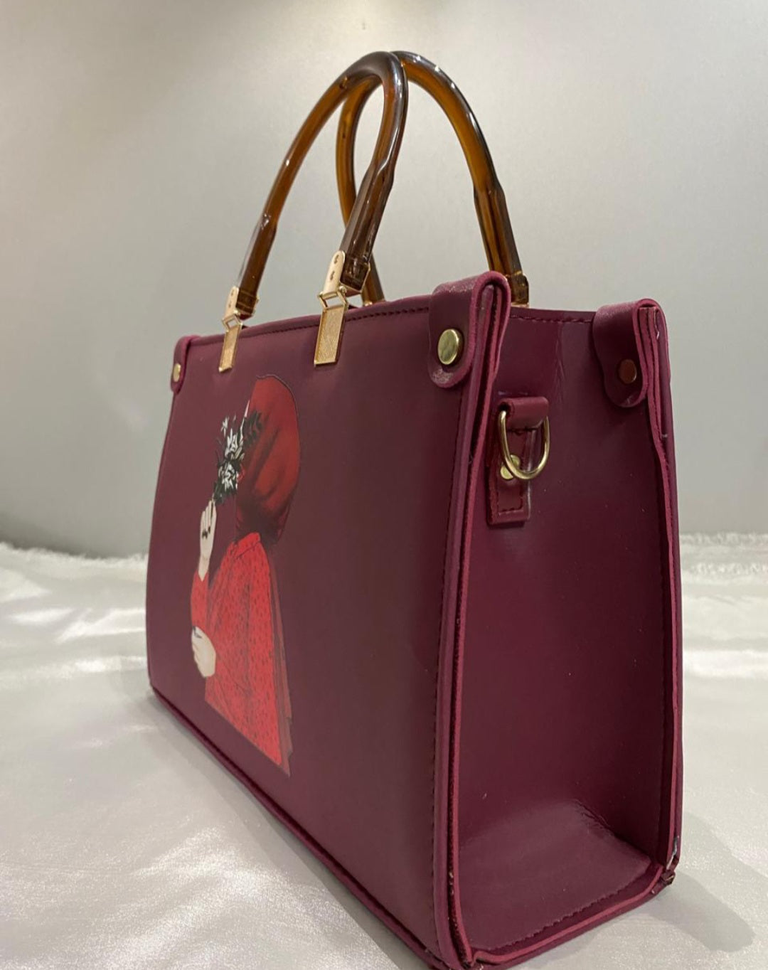 a Burgundy Bamboo Handle Handbag – Luxury Statement Tote