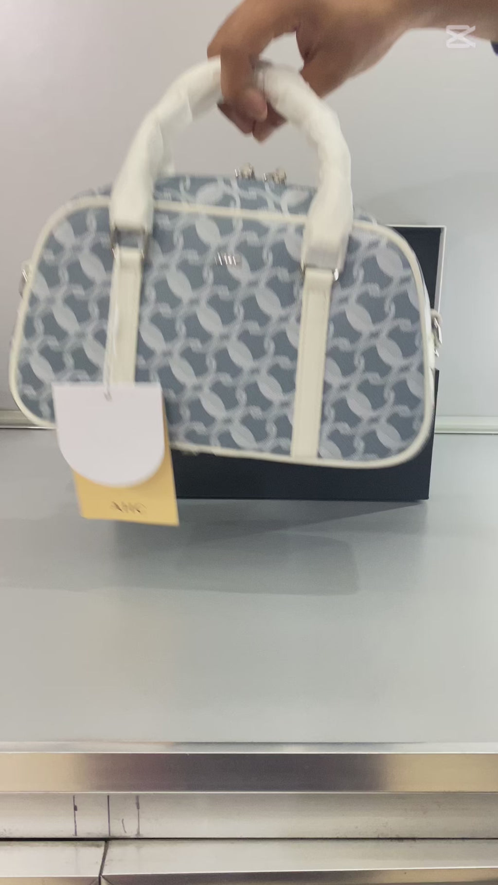 A  Elegant Blue Jacquard Mini Boston Bag with Ivory Leather Trim